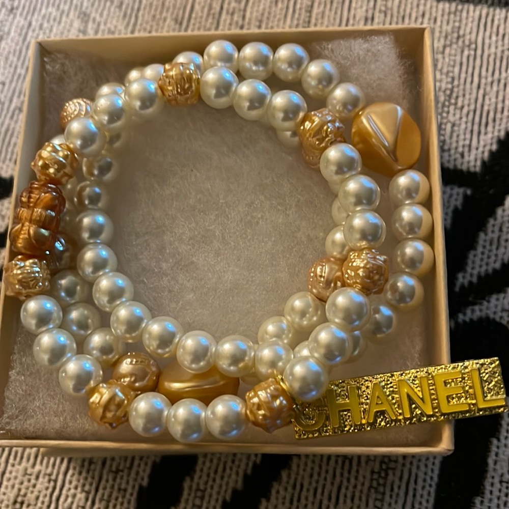 3 White bracelets